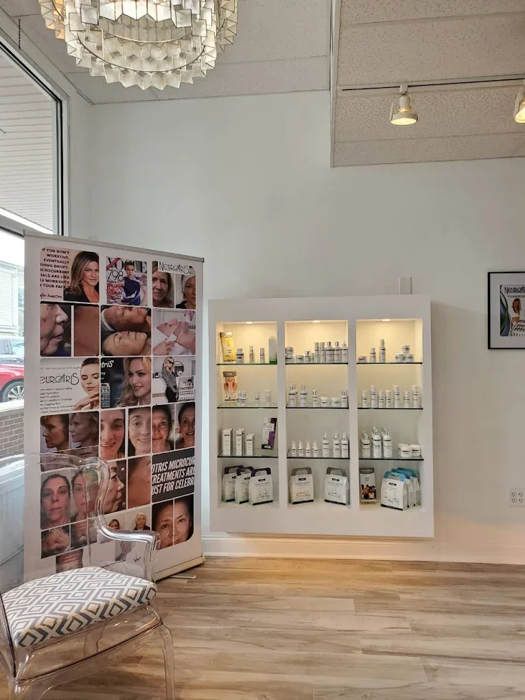 The reception and waiting area at MySkin in downtown Milford, with natural light and product display